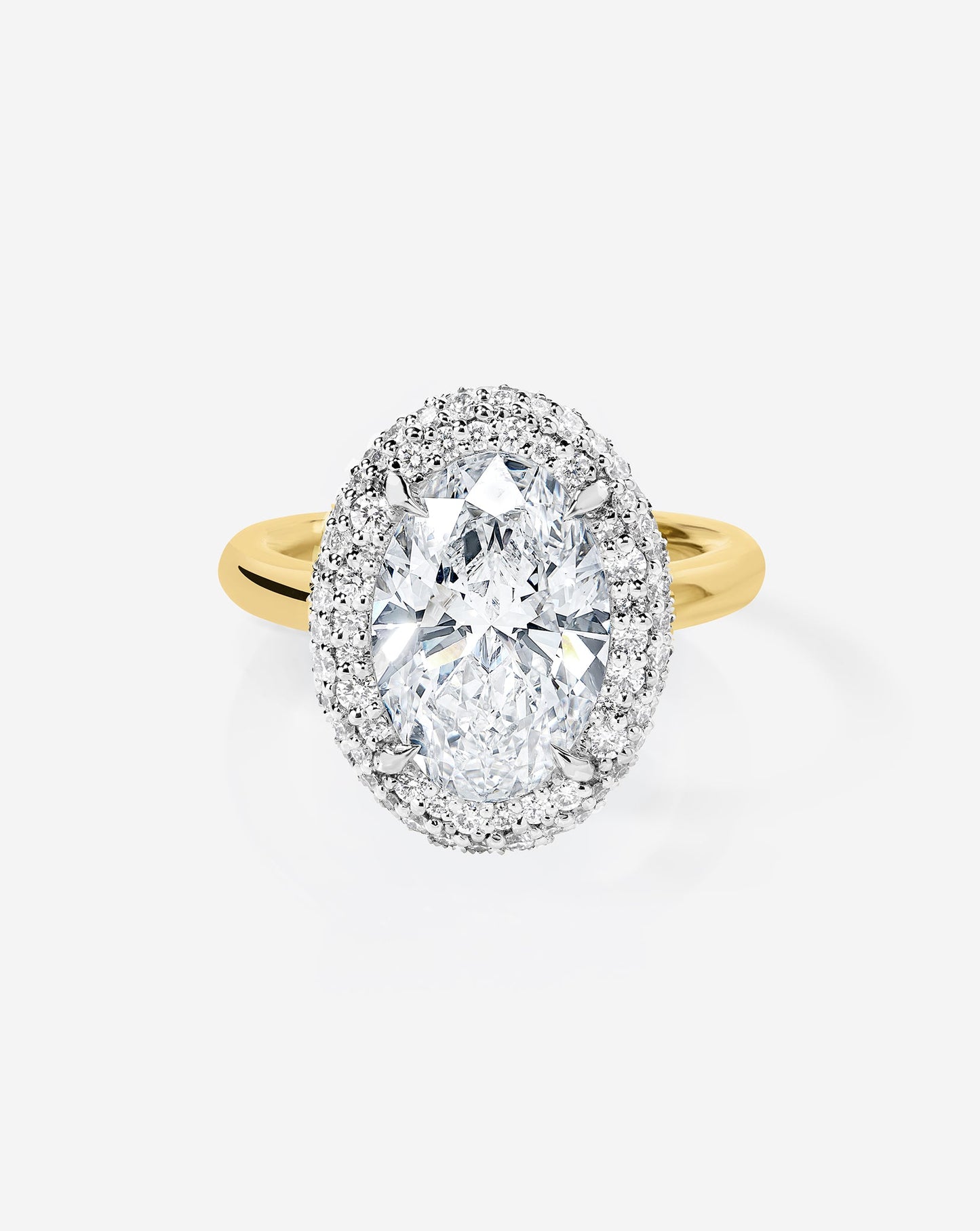 3.10 Oval Lab Diamond in Cloud Bezel with Pavé Halo