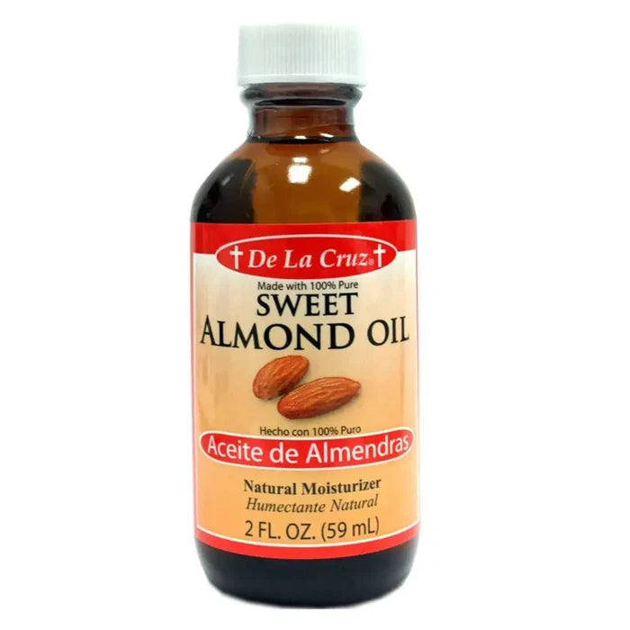 Wholesale De La Cruz Almond Oil 2oz Stock up on natural almond oil Available in bulk at Mexmax INC.